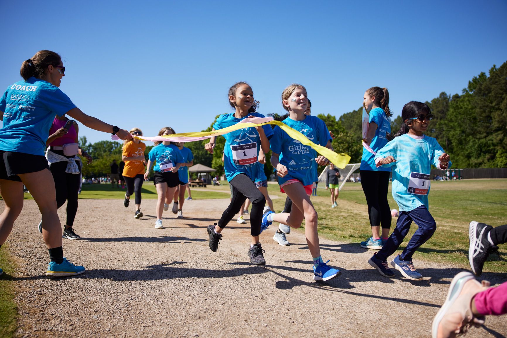 Girls crossing the finish line - Girls on the Run